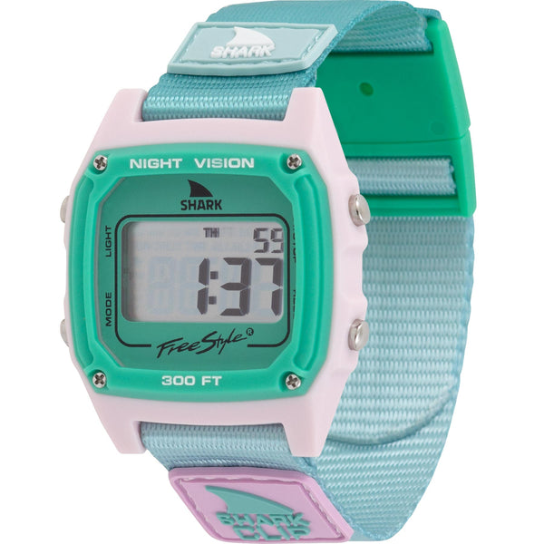 Close-up of the Pure Aqua watch with a mint green face, alarm settings, night vision backlight, and a comfortable Shark Clip strap.